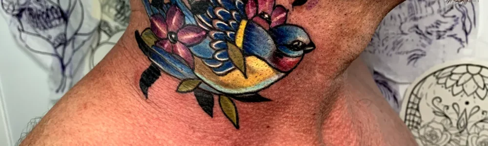 Swallow tattoo in Nero Tattoo Parlour